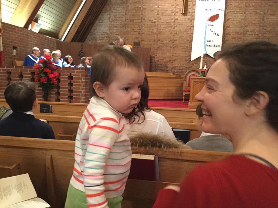 Little G in the pew with Mom