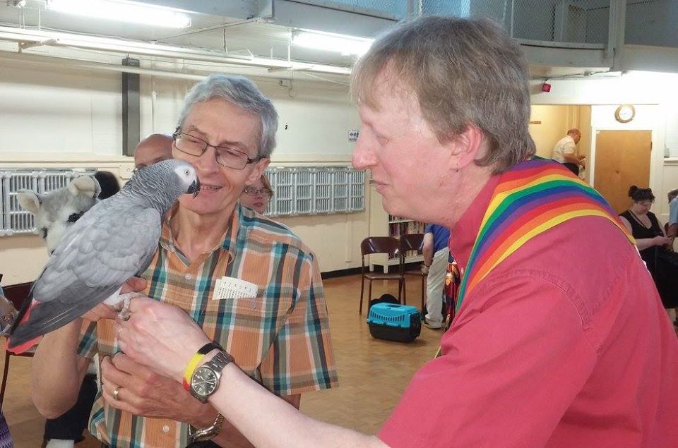 Rev. Read blesses Murray's parrot